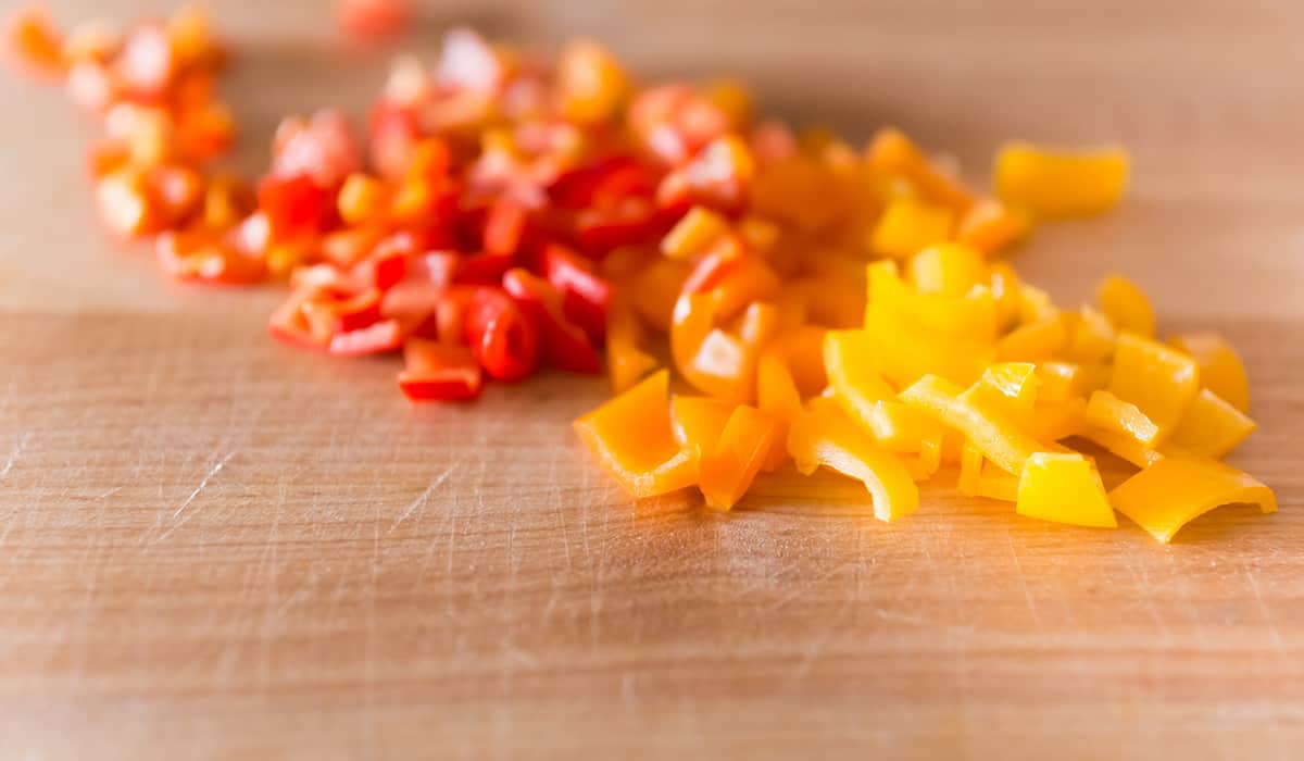 chopped multi colored bell peppers for meal prep for beginners
