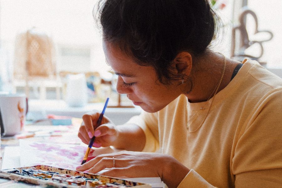 Woman leveraging her hobby of painting as a way to make money